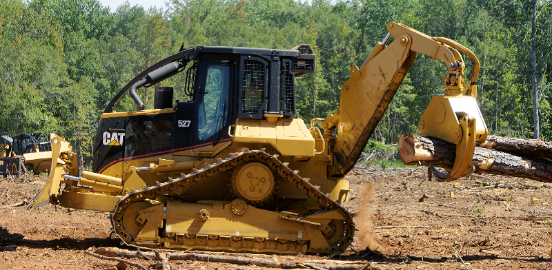 Гусеничный трелевочный трактор Caterpillar